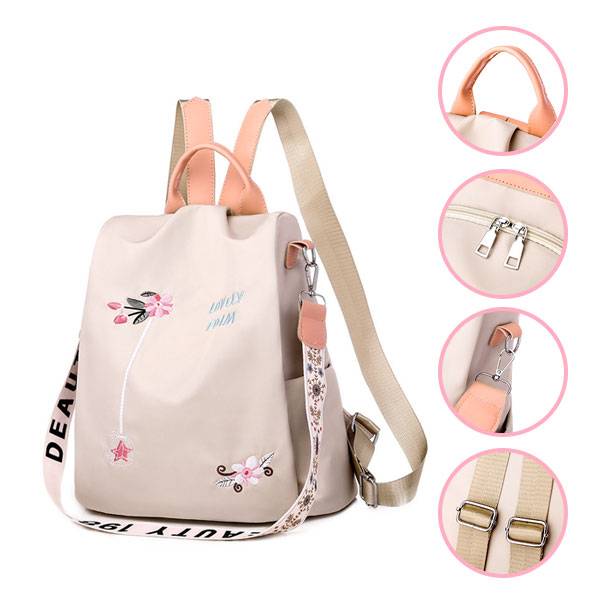 MOCHILA CON ADORNOS FLORALES - BEIGE