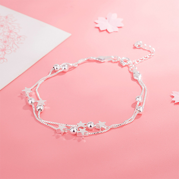 PULSERA DOBLE CON ESTRELLAS